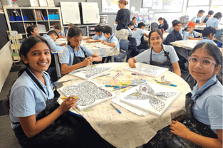 Students participating in an art workshop
